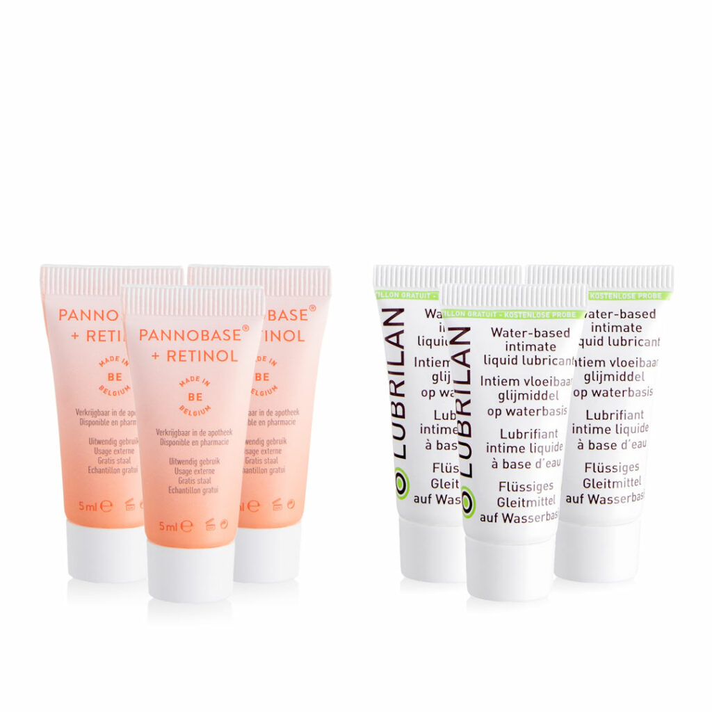 Orange pannobase and white Lubrilan cosmetic samples with white background